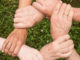 arbeitskollegen haende-team-spirit