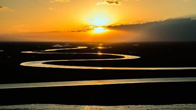 sonnenuntergang fluss prairie